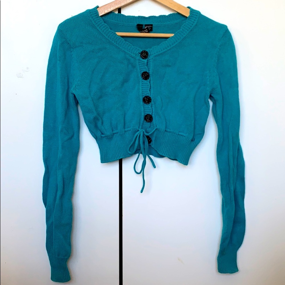 Turquoise cropped sweater with black rose buttons